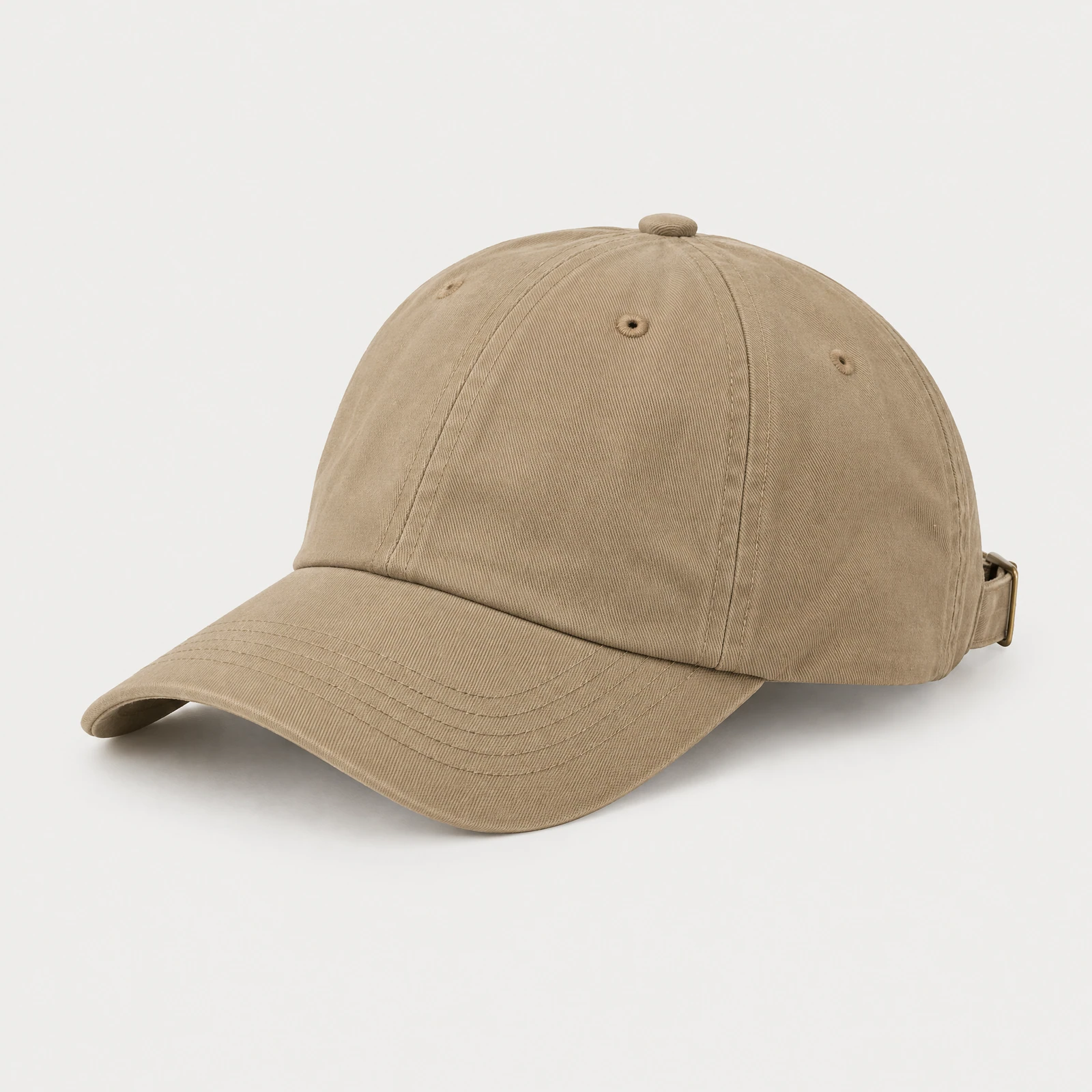 Plain khaki six-panel baseball cap with a curved brim photographed on a light gray background